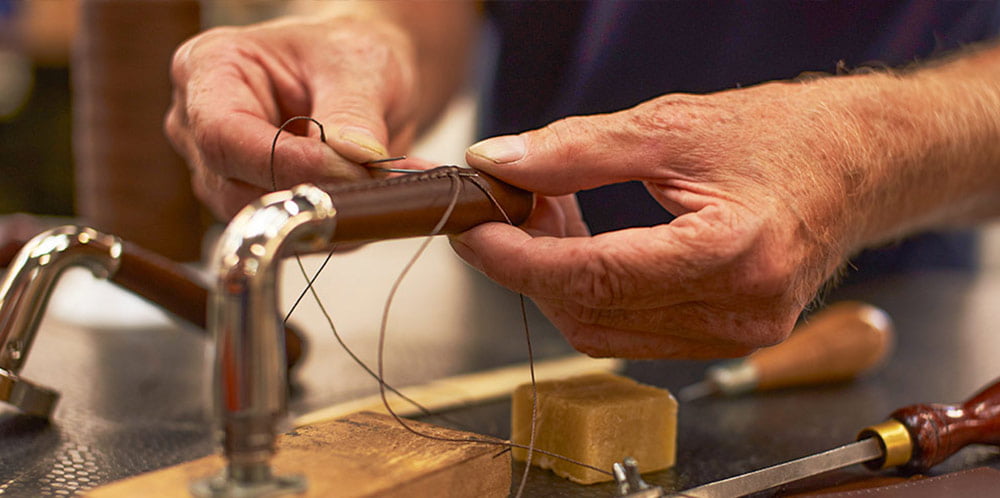 HAND STITCHING TUBE DOOR LEVERS