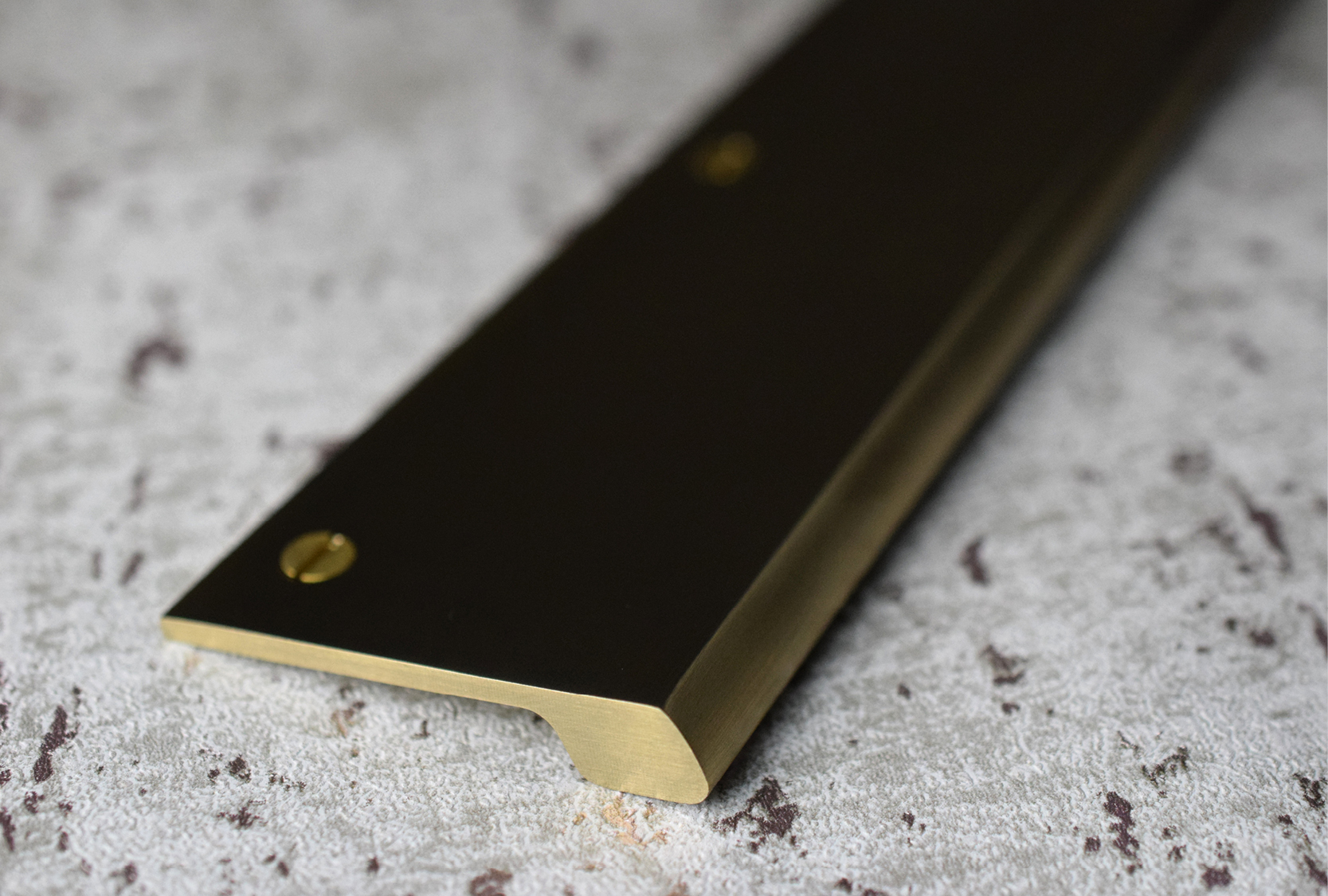 This Image displays a solid sonar edge pull. Finished in polished brass metal finish.